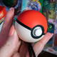 A photo of a Poke ball plus